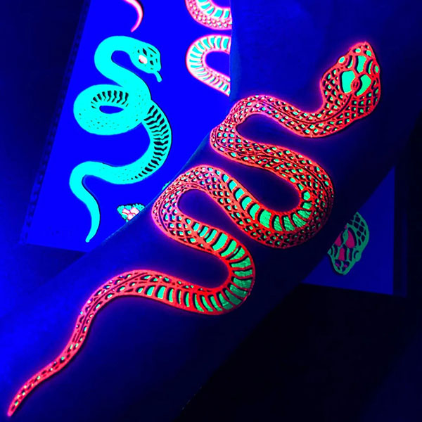 Glow in the Dark Snake Tattoos